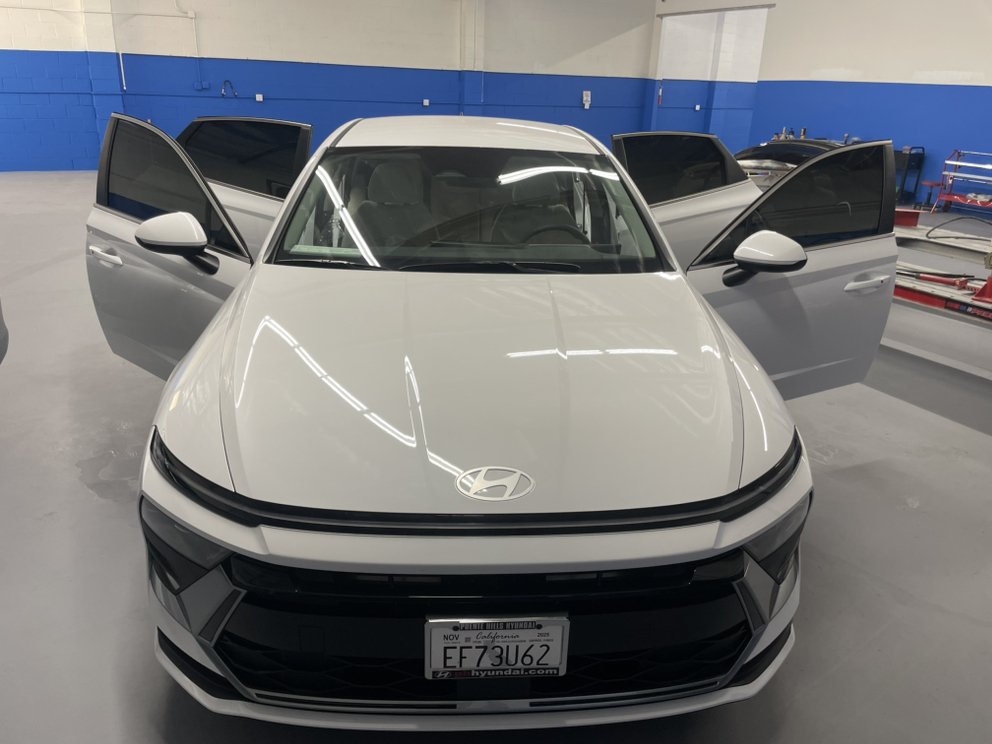 Vehicle in professional tinting bay